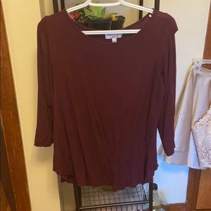 Maroon shirt with arm cut outs